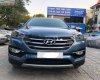 Hyundai Santa Fe 2017 - Cần bán gấp Hyundai Santa Fe đời 2017, màu xanh lam, xe còn mới lắm