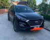 Hyundai Tucson   2021 - Cần bán Hyundai Tucson 2021, màu đen còn mới 