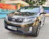 Kia Sorento  2.4AT 2016 - Cần bán gấp Kia Sorento 2.4AT năm sản xuất 2016, màu nâu  