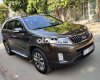 Kia Sorento  2.4AT 2016 - Cần bán gấp Kia Sorento 2.4AT năm sản xuất 2016, màu nâu  
