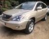 Lexus RX 330 2004 - Cần bán xe Lexus RX 330 năm sản xuất 2004, màu vàng, xe nhập