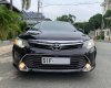 Toyota Camry 2.0E 2016 - Chính chủ cần bán xe Toyota Camry model 2016 , màu đen nội thất kem