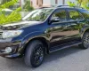 Toyota Fortuner 2015 - Chính chủ bán xe Toyota Fortuner đời 2015 màu đen nội thất kem, 2.7 một cầu máy xăng số tự động.