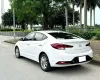 Hyundai Elantra 1.6 AT 2021 - Bán xe Hyundai Elantra 1.6 AT sản xuất 2021, màu trắng, xe chạy ít đi gia đình