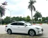 Hyundai Elantra 1.6 AT 2021 - Bán xe Hyundai Elantra 1.6 AT sản xuất 2021, màu trắng, xe chạy ít đi gia đình