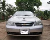 Chevrolet Lacetti 2011 - Chevrolet Lacetti 1.6 MT 2011, màu bạc, 5 chỗ ngồi.