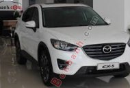 Mazda CX 5 2.0AT 2016 - Cần bán Mazda CX 5 2.0AT đời 2016, màu trắng giá 1 tỷ 39 tr tại Bình Phước