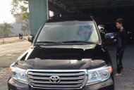 Toyota Land Cruiser 2014 - Cần bán gấp Toyota Land Cruiser đời 2014, màu đen xe gia đình giá 3 tỷ 50 tr tại Quảng Ninh