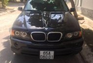 BMW X5 2002 - Bán xe BMW X5 sản xuất 2002, màu đen, nhập khẩu chính hãng giá 300 triệu tại Tp.HCM