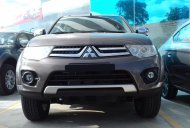 Mitsubishi Pajero Sport 4x2 AT   2016 - Cần bán Mitsubishi Pajero Sport 4x2 AT máy xăng đời 2016, màu nâu giá 892 triệu tại Tp.HCM