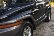 Ssangyong Korando   2004 - Bán gấp Ssangyong Korando đời 2004, màu đen, giá chỉ 165 triệu giá 165 triệu tại Phú Thọ