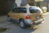 Hyundai Santa Fe   2005 - Bán xe cũ Hyundai Santa Fe đời 2005, màu vàng chính chủ, 250tr giá 250 triệu tại Đồng Tháp