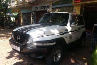 Ssangyong Musso 2003 - Bán Ssangyong Musso năm sản xuất 2003, màu trắng giá 156 triệu tại Bắc Ninh