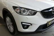 Mazda CX 5 2.0 AT 2WD 2014 - Bán Mazda CX 5 2.0AT màu trắng, số tự động, sản xuất T12/2014, biển tỉnh, 1 chủ giá 718 triệu tại Tp.HCM