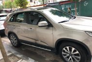 Kia Sorento AT 2014 - Bán Kia Sorento 2014 số AT dẫn động 2WD, chạy dầu 6.1lít/100km, màu nâu, nội thất đen giá 699 triệu tại Hà Nội