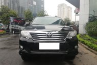 Toyota Fortuner V 2014 - Bán Toyota Fortuner số tự động đời 2014, màu đen, hỗ trợ trả góp cao giá 750 triệu tại Hà Nội