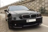 BMW 7 Series  750Li  2005 - Bán ô tô BMW 7 Series 750Li sản xuất năm 2005, màu đen số tự động giá 650 triệu tại Hà Nội