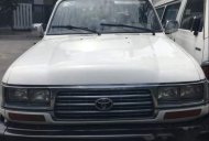 Toyota Land Cruiser 1996 - Bán Toyota Land Cruiser sản xuất 1996, màu trắng, nhập khẩu, 7 chỗ giá 140 triệu tại Tp.HCM