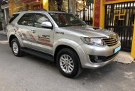 Toyota Fortuner G 2015 - Cần bán xe Toyota Fortuner 2015, số sàn, máy dầu, màu bạc giá 795 triệu tại Tp.HCM