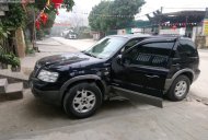 Ford Escape 2005 - Bán xe cũ Ford Escape 2.3 AT sản xuất năm 2005, màu đen giá 195 triệu tại Thanh Hóa