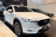 Mazda CX 5 Deluxe 2019 - Bán gấp chiếc Mazda CX 5 Deluxe sản xuất năm 2019, màu trắng, giá tốt giá 858 triệu tại Hà Nội
