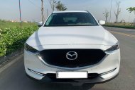 Mazda CX 5 2018 - Cần bán gấp Mazda CX 5 năm sản xuất 2018, màu trắng xe gia đình giá 929 triệu tại Bình Dương