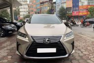 Lexus RX   2016 - Cần bán lại xe Lexus RX đời 2016, màu vàng, xe nhập giá 3 tỷ 390 tr tại Hà Nội