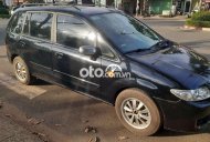 Mazda Premacy 2002 - Cần bán Mazda Premacy sản xuất 2002, màu đen ít sử dụng giá 145 triệu tại Tp.HCM