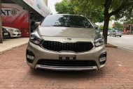 Kia Rondo 2.0 GAT 2017 - Cần bán lại xe Kia Rondo 2.0 GAT năm 2017, màu vàng cát, 485 triệu giá 485 triệu tại Hà Nội