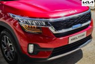 Kia Seltos Deluxe 2021 - Cần bán xe Kia Seltos Deluxe sản xuất năm 2021, màu đỏ giá 634 triệu tại Hà Nội