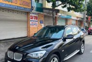 BMW X1 2011 - Màu đen, nhập khẩu nguyên chiếc còn mới giá 410 triệu tại Bình Dương