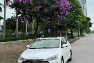 Hyundai Elantra 1.6 AT 2021 - Cần bán xe Hyundai Elantra 1.6 AT đời 2021, màu trắng, xe đi gia đình chạy ít giá 530 triệu tại Hà Nội