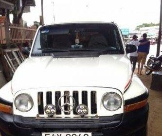 Ssangyong Korando AT 2000 - Cần bán lại xe Ssangyong Korando AT đời 2000, màu trắng, nhập khẩu