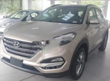 Hyundai Tucson 2.0 ATH 2018 - Bán xe Hyundai Tucson 2.0 ATH sản xuất năm 2018, màu vàng, giá 825tr